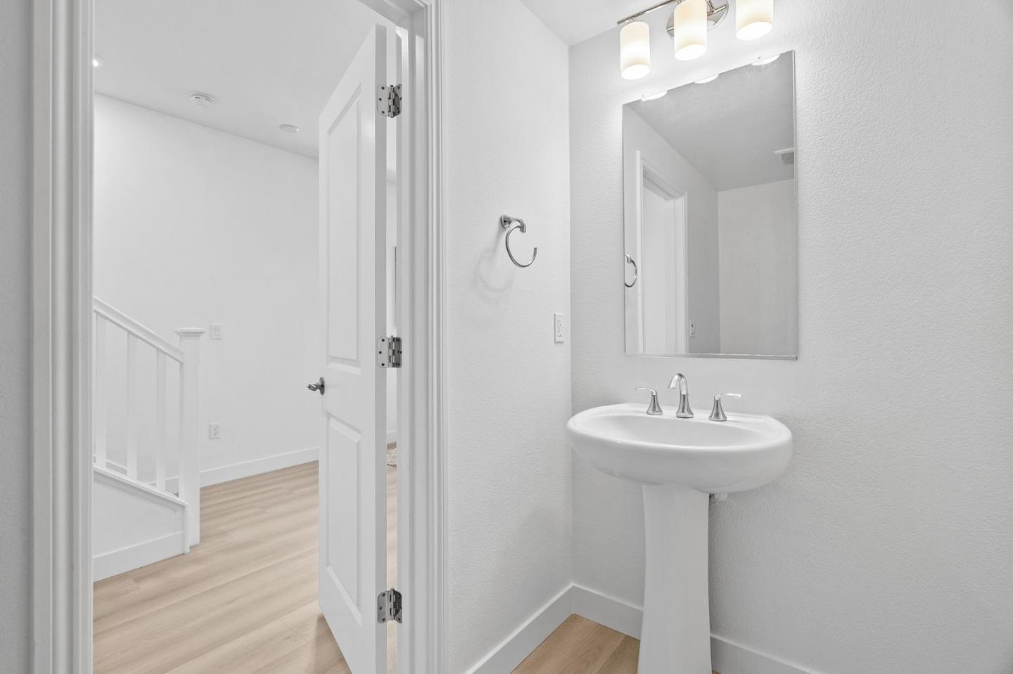 1453 Cherry Circle Milpitas, CA 95035 - Photo 7 of 53 a bathroom with a sink a mirror and shower