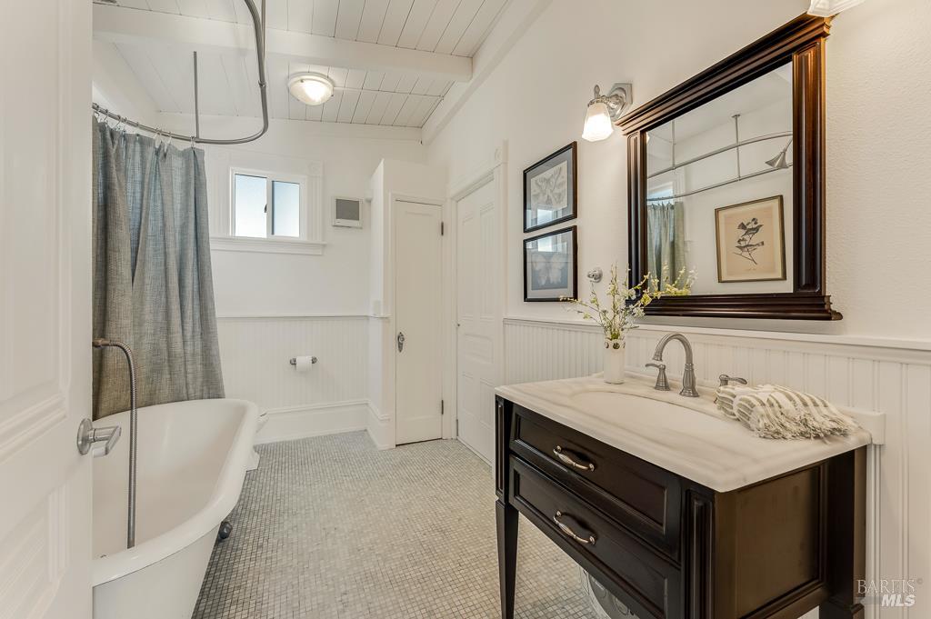 486 South Main Street Sebastopol, CA 95472 - Photo 14 of 27 a bathroom with a sink and a mirror