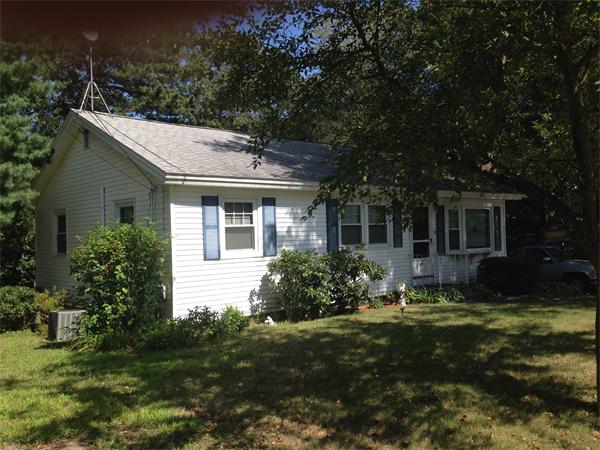 31 A George Brown Street Billerica, MA 01821 - Photo 2 of 8 a front view of house with yard and green space