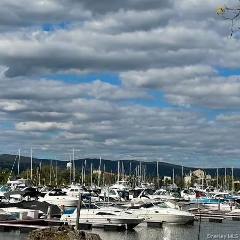 a group of cars parked in front of house
