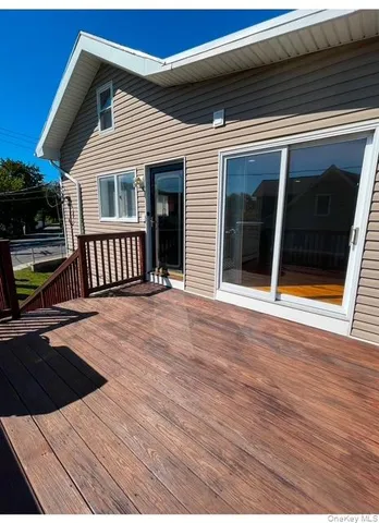 a view of a house with a wooden floor