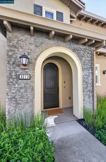 a front view of a house with garage
