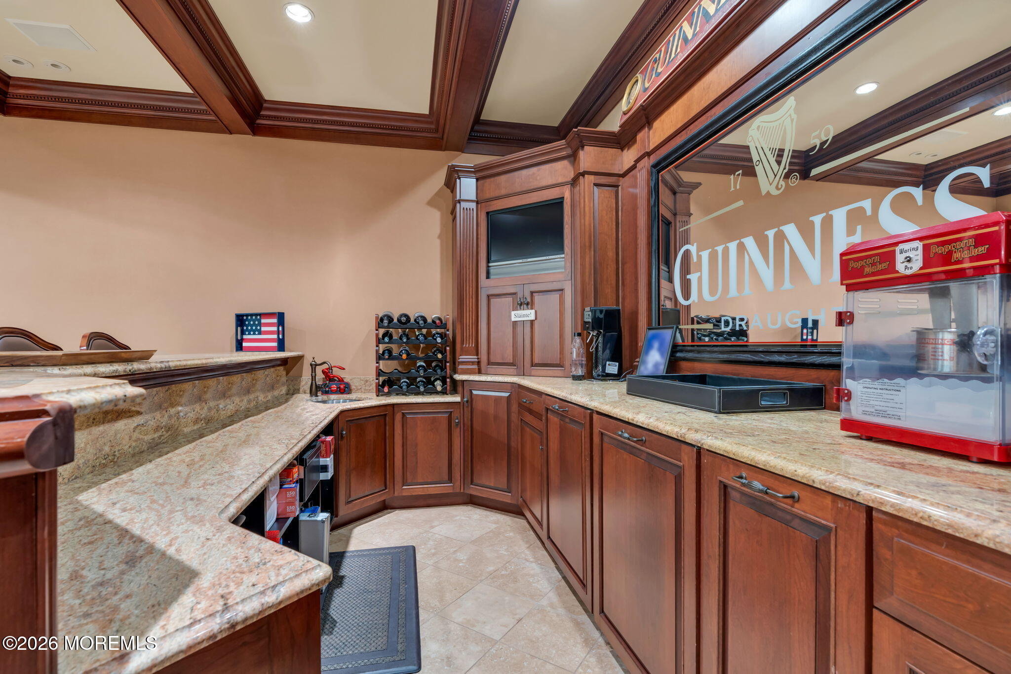 672 Winding River Road Brick, NJ 08724 - Photo 77 of 111 a kitchen with stainless steel appliances granite countertop a sink a stove and a wooden cabinets
