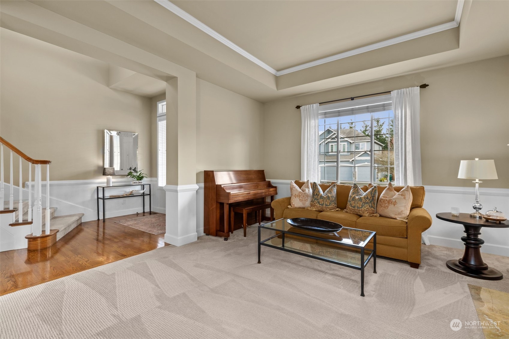 20828 37th Avenue Southeast Bothell, WA 98021 - Photo 15 of 38 a living room with furniture and a wooden floor
