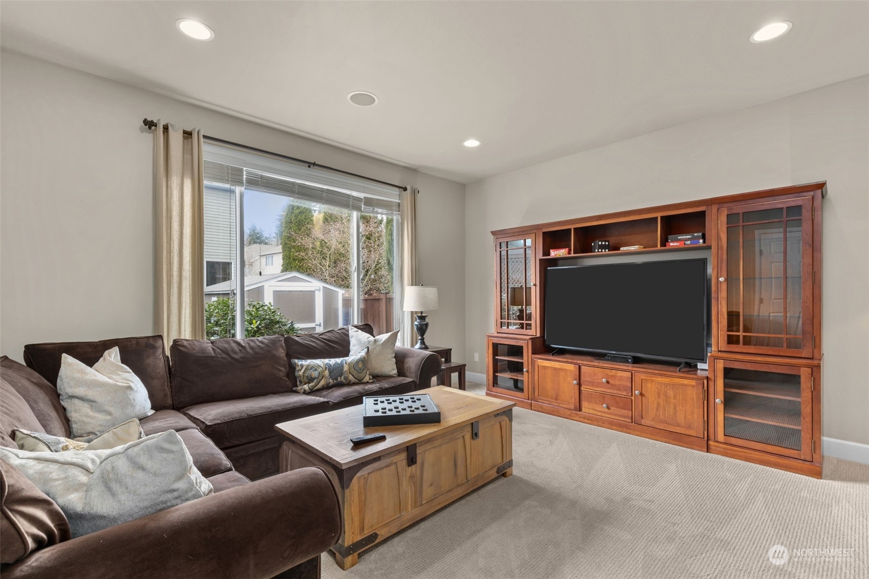 20828 37th Avenue Southeast Bothell, WA 98021 - Photo 17 of 38 a living room with furniture and a flat screen tv