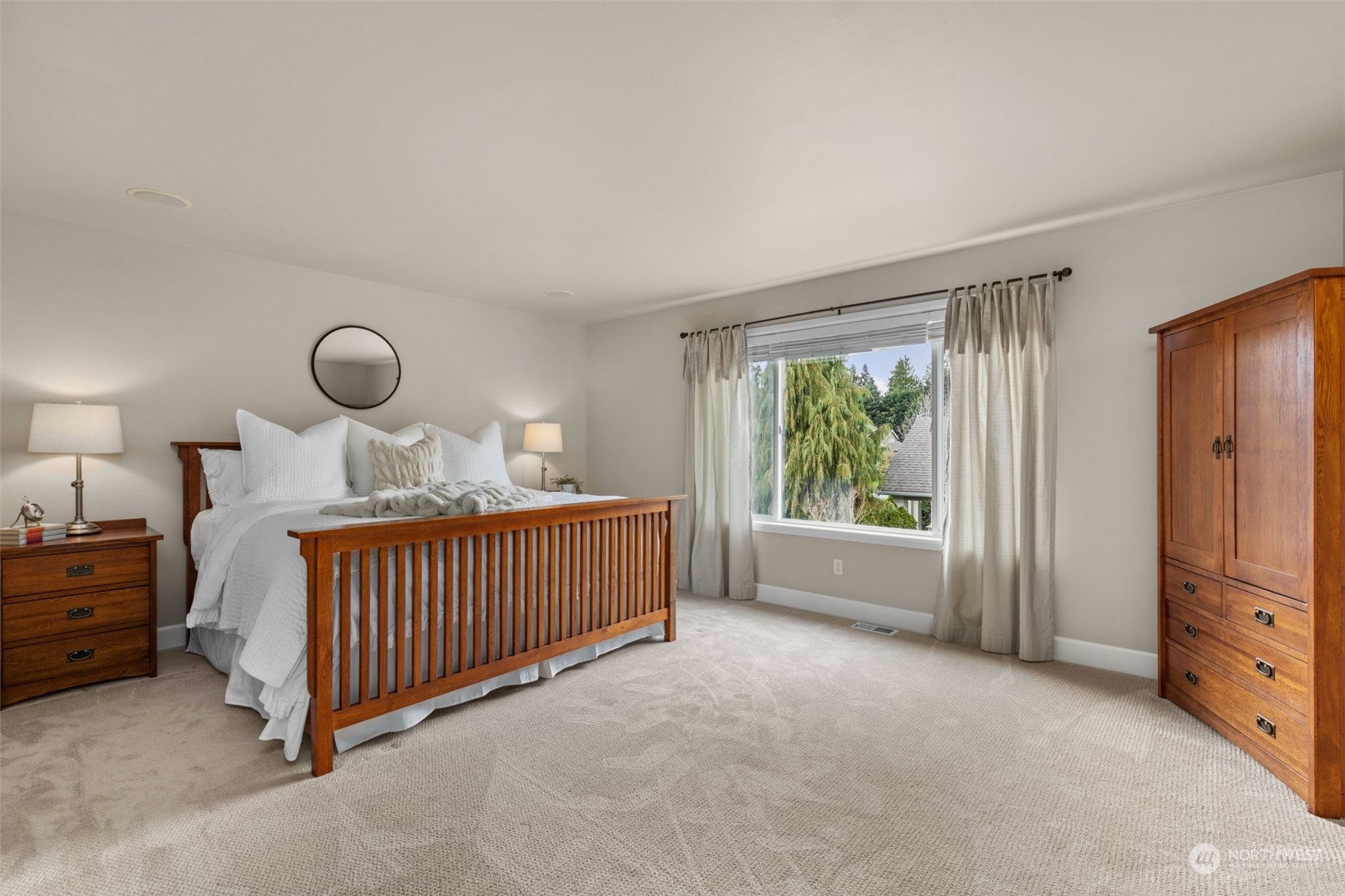 20828 37th Avenue Southeast Bothell, WA 98021 - Photo 21 of 38 a bedroom with a bed and window