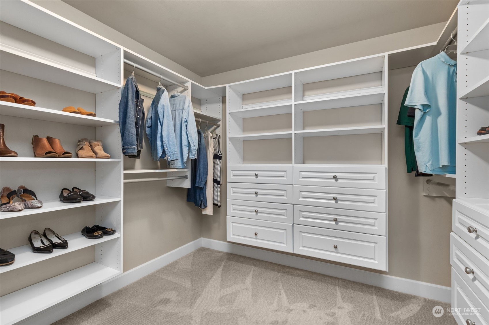 20828 37th Avenue Southeast Bothell, WA 98021 - Photo 23 of 38 a view of walk in closet with clothes and shoes