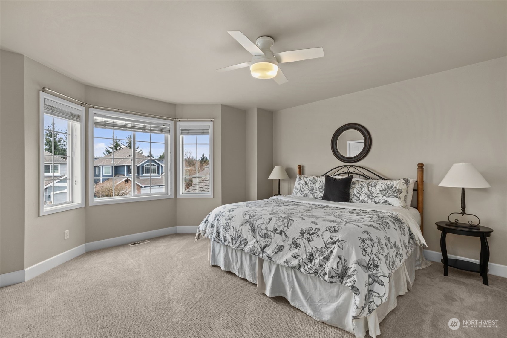 20828 37th Avenue Southeast Bothell, WA 98021 - Photo 24 of 38 a bedroom with a large bed and a window