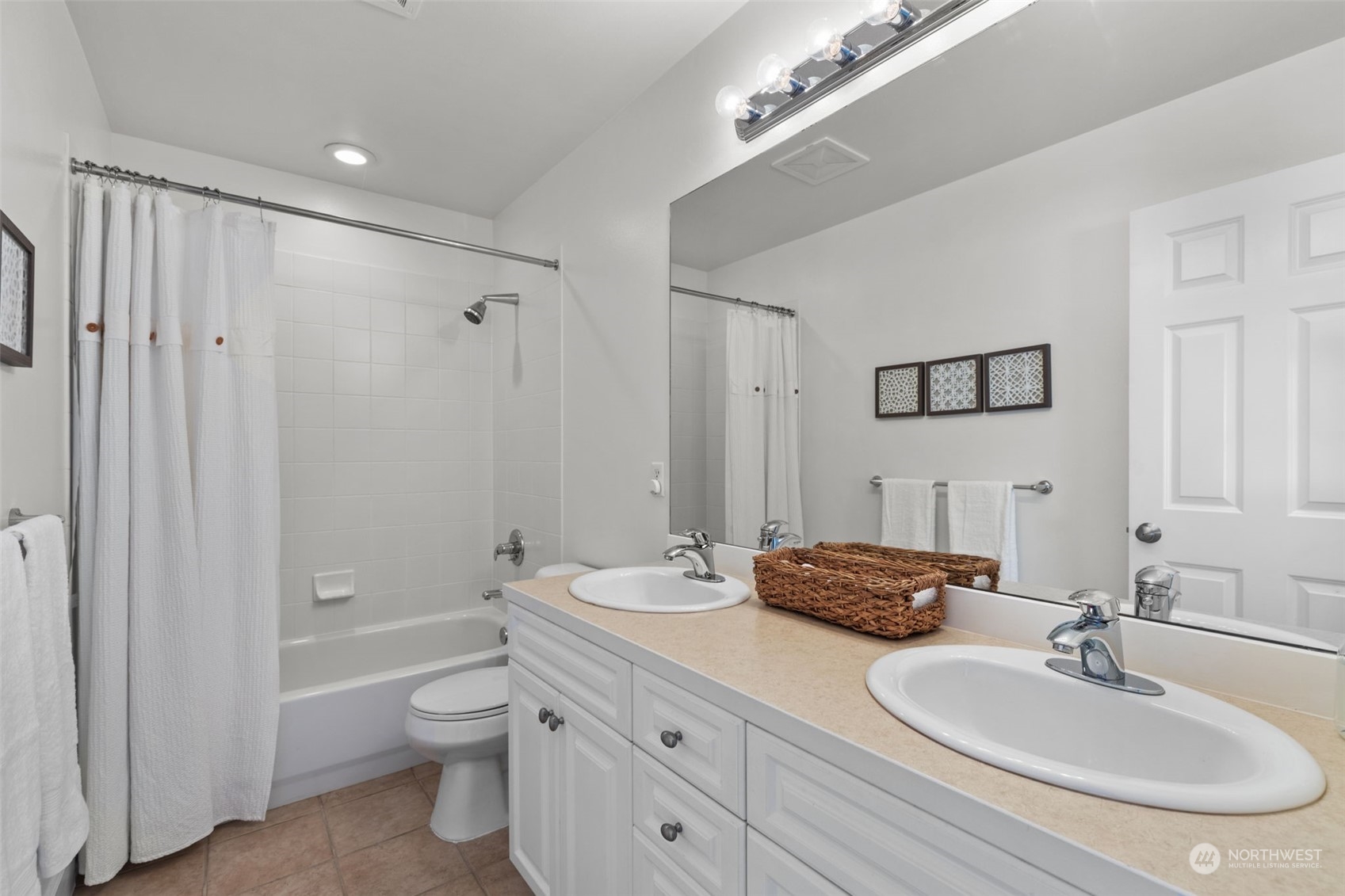 20828 37th Avenue Southeast Bothell, WA 98021 - Photo 25 of 38 a bathroom with a granite countertop sink a toilet and shower