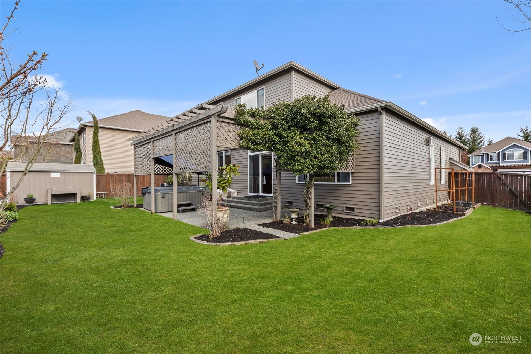 20828 37th Avenue Southeast Bothell, WA 98021 - Photo 35 of 38 a front view of a house with patio and garden