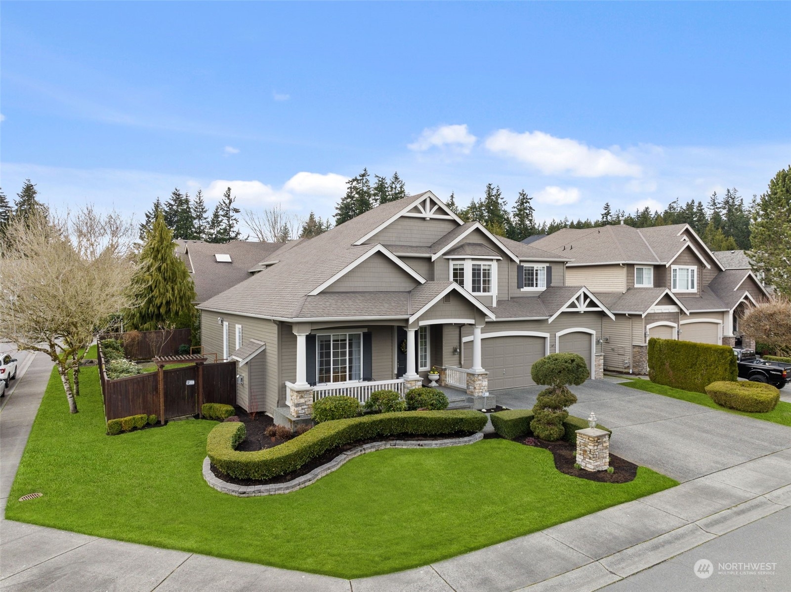 20828 37th Avenue Southeast Bothell, WA 98021 - Photo 36 of 38 a front view of a house with garden