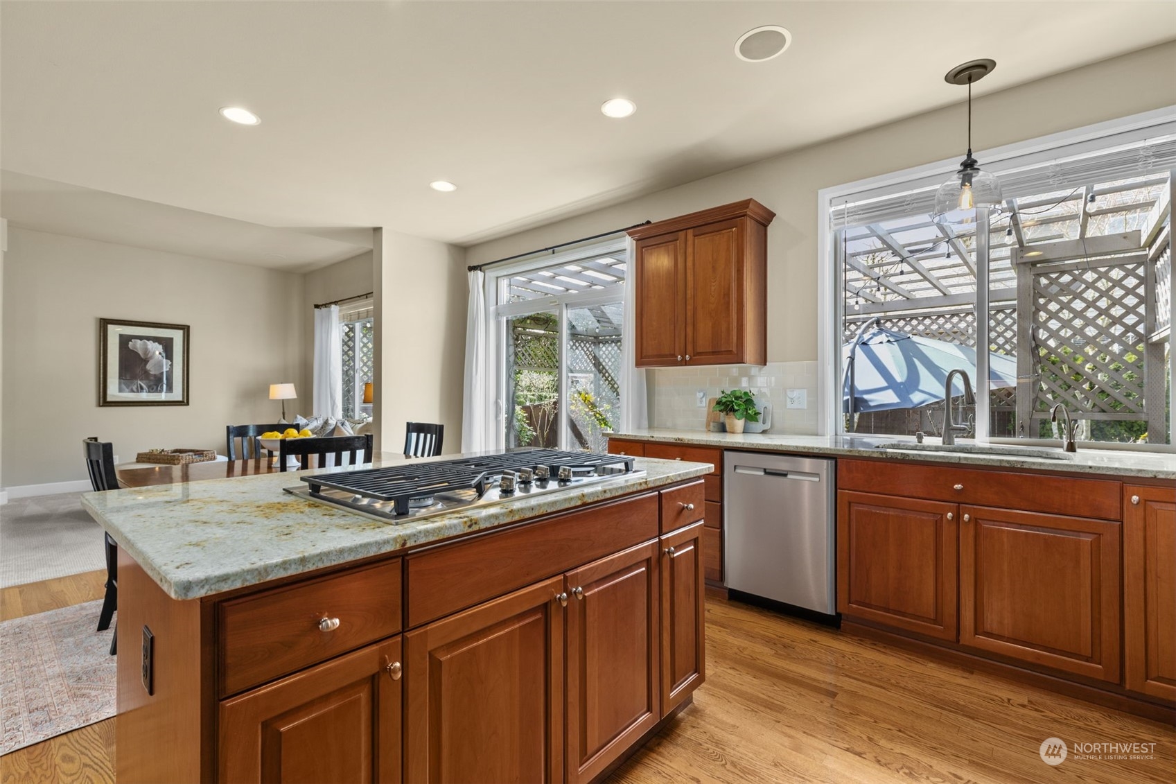 20828 37th Avenue Southeast Bothell, WA 98021 - Photo 8 of 38 a kitchen with stainless steel appliances granite countertop a sink stove and cabinets