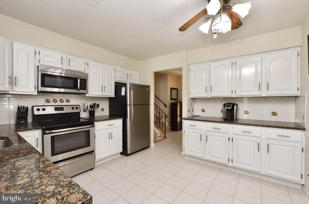 1305 East Jefferson Road Sterling, VA 20164 - Photo 11 of 34 Gourmet kitchen boasts SS appl. and many cabinets