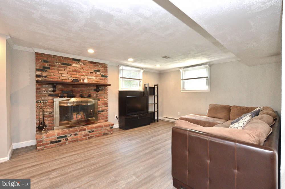 1305 East Jefferson Road Sterling, VA 20164 - Photo 22 of 34 Cozy wood burning brick hearth fire place