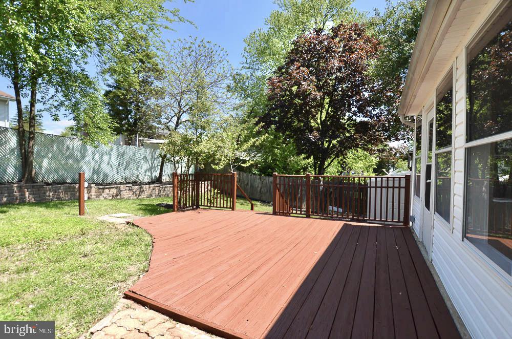 1305 East Jefferson Road Sterling, VA 20164 - Photo 28 of 34 Spacious deck off family room & sunroom