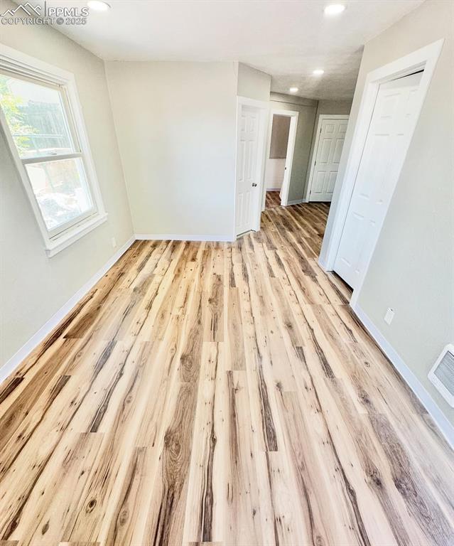 716-718 West Madison Street Colorado Springs, CO 80907 - Photo 4 of 8 a view of wooden floor in a room