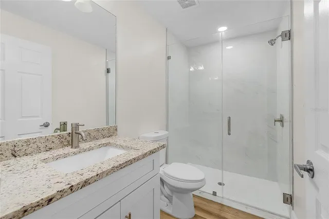 a view of a hallway with washer and dryer
