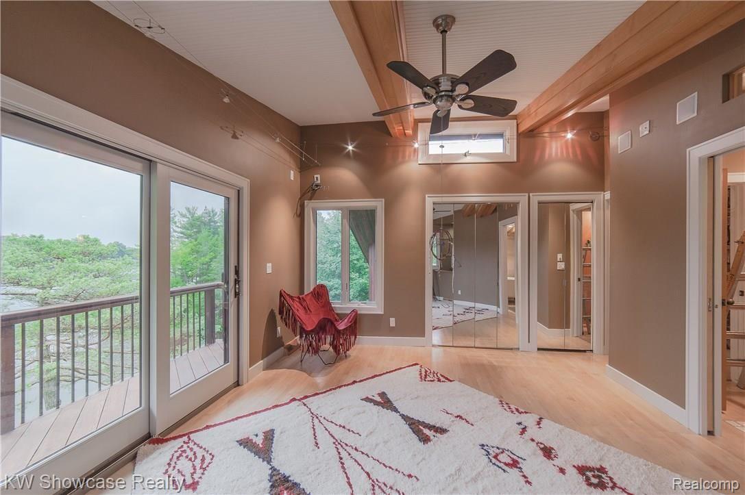 1110 Seneca Road Lake Orion, MI 48362 - Photo 23 of 50 2nd floor Master Bedroom with Splendid Sunrise and Sunset Views