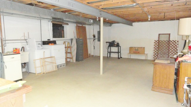 11 Prairie Drive Addison, IL 60101 - Photo 17 of 20 a living room with furniture and a table