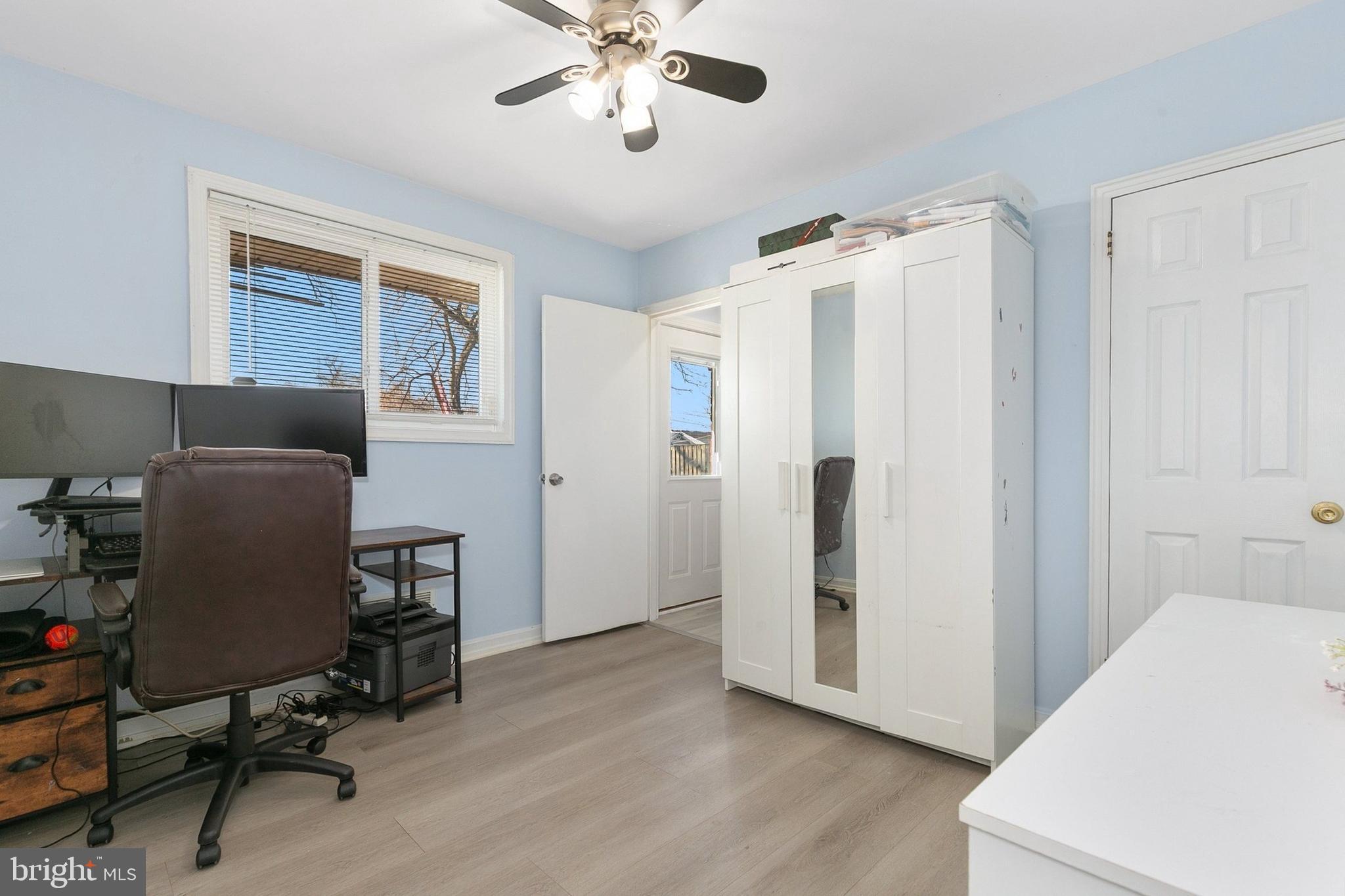 9632 Cottrell Terrace Silver Spring, MD 20903 - Photo 19 of 36 a view of a workspace with furniture and a window