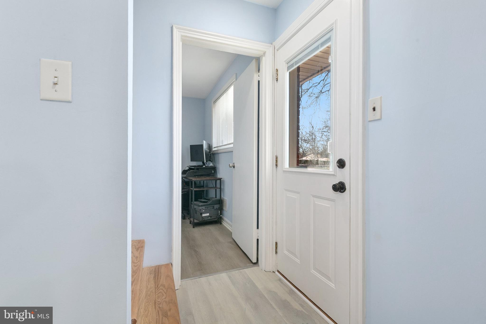 9632 Cottrell Terrace Silver Spring, MD 20903 - Photo 21 of 36 a view of a bathroom from a hallway
