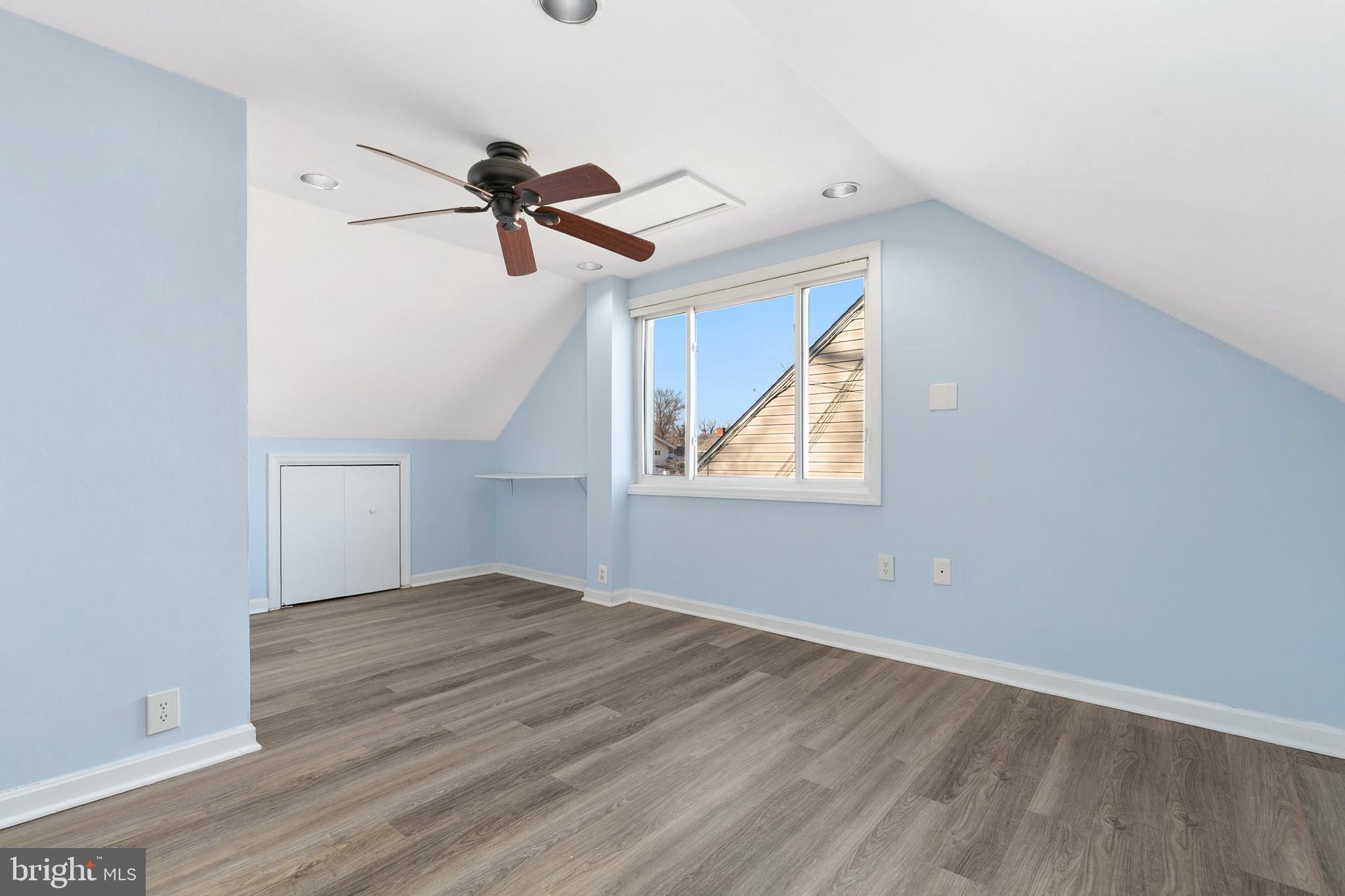 9632 Cottrell Terrace Silver Spring, MD 20903 - Photo 24 of 36 an empty room with windows and fan