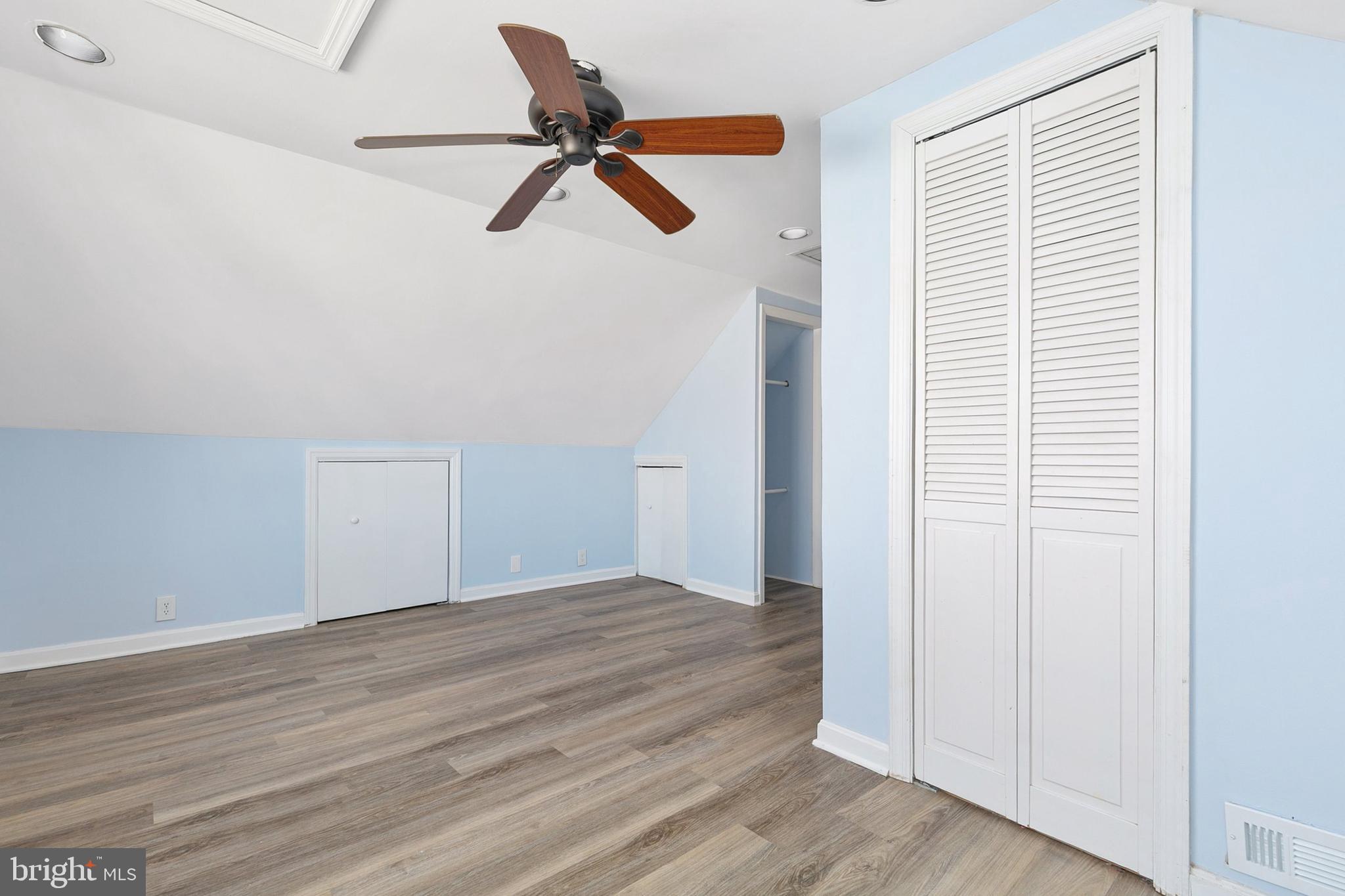 9632 Cottrell Terrace Silver Spring, MD 20903 - Photo 25 of 36 a view of a room with wooden floor and windows