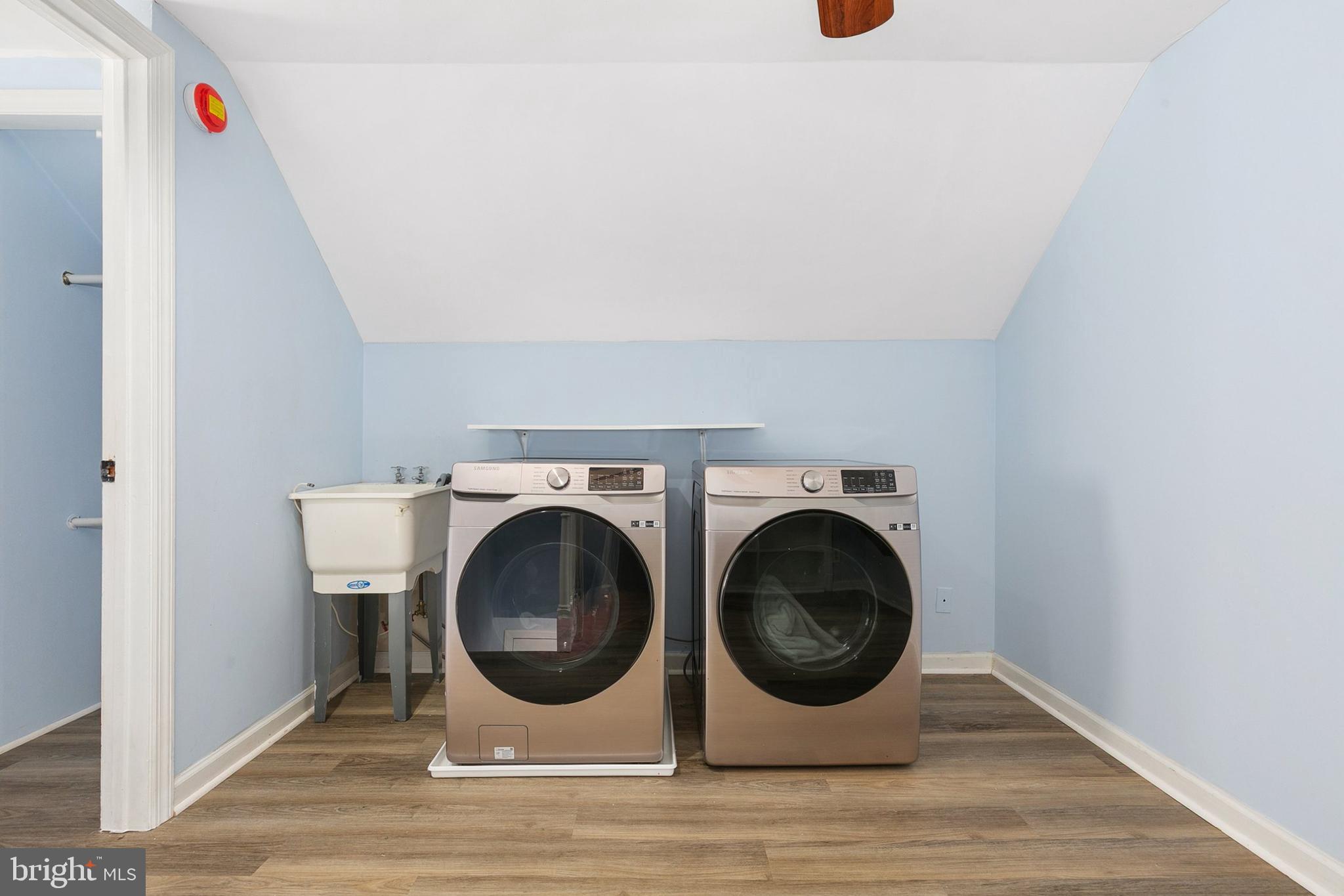 9632 Cottrell Terrace Silver Spring, MD 20903 - Photo 29 of 36 a utility room with dryer and washer