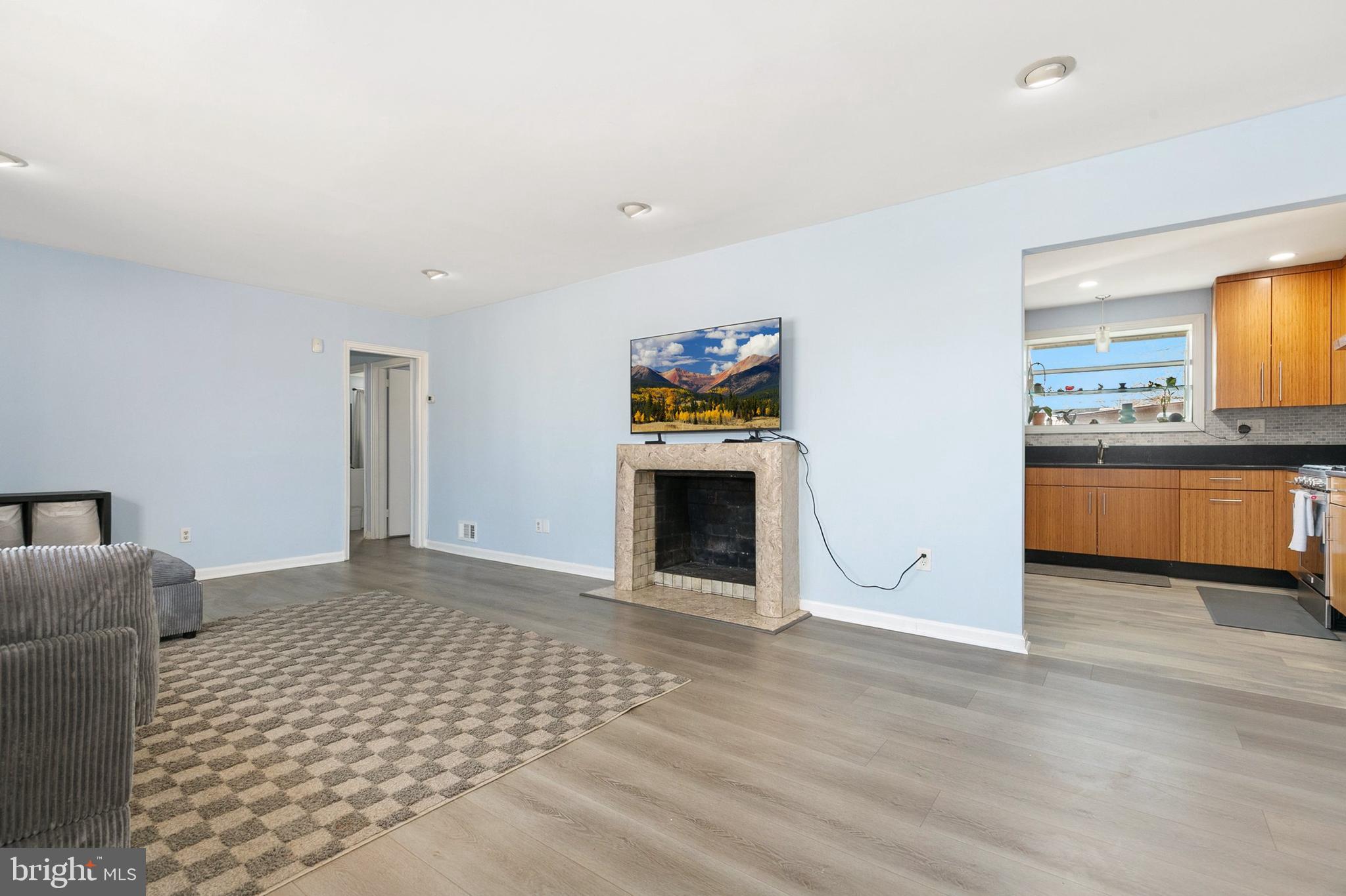 9632 Cottrell Terrace Silver Spring, MD 20903 - Photo 5 of 36 a view of a livingroom with a fireplace