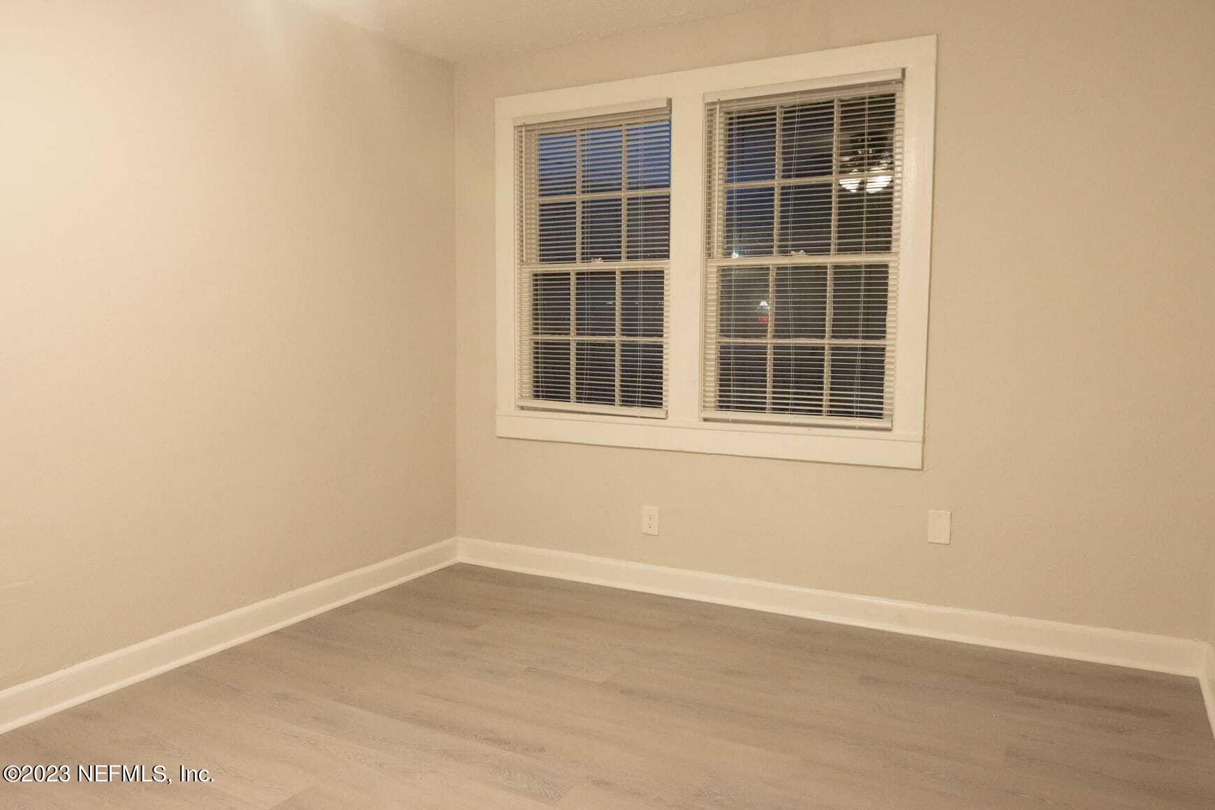 3910 Grant Road Jacksonville, FL 32207 - Photo 13 of 32 a view of empty room with windows