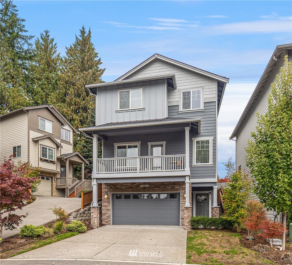 5 157th Lane Southeast Bothell, WA 98012 - Photo 1 of 27 a front view of a house with a garden