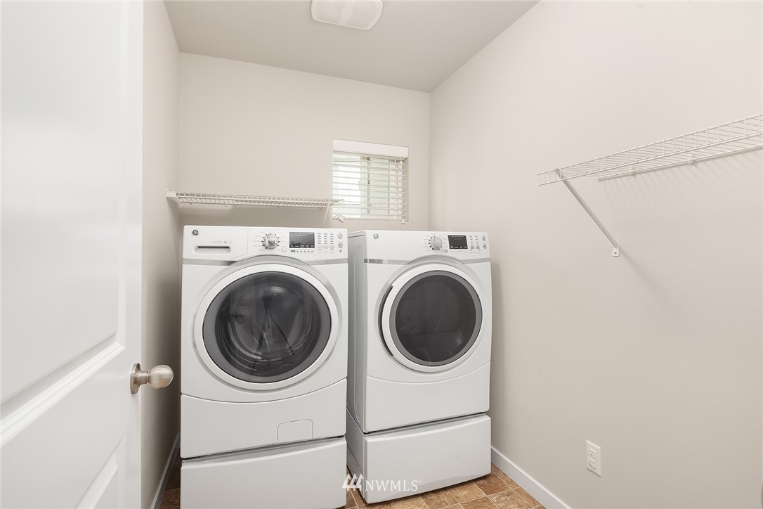 5 157th Lane Southeast Bothell, WA 98012 - Photo 20 of 27 a utility room with dryer and washer