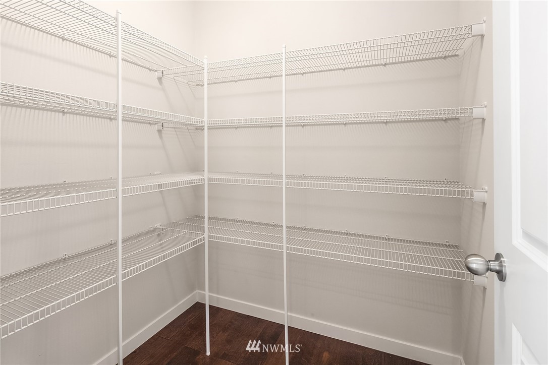5 157th Lane Southeast Bothell, WA 98012 - Photo 6 of 27 a view of a room with empty racks