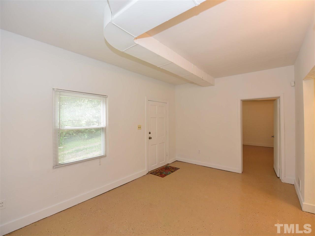 726 South State Street Raleigh, NC 27601 - Photo 19 of 25 an empty room with windows