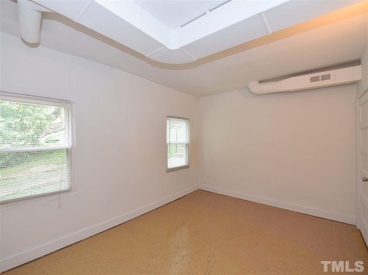 726 South State Street Raleigh, NC 27601 - Photo 20 of 25 a view of an empty room with a window