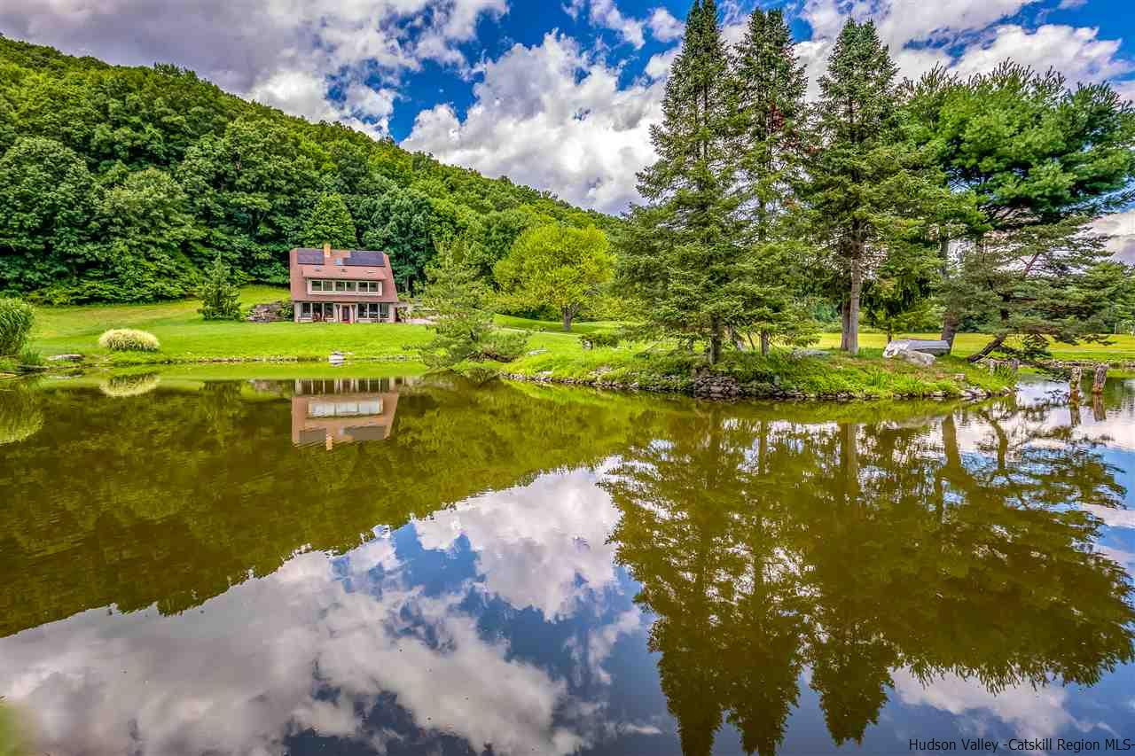 a view of a lake with a building in front of it