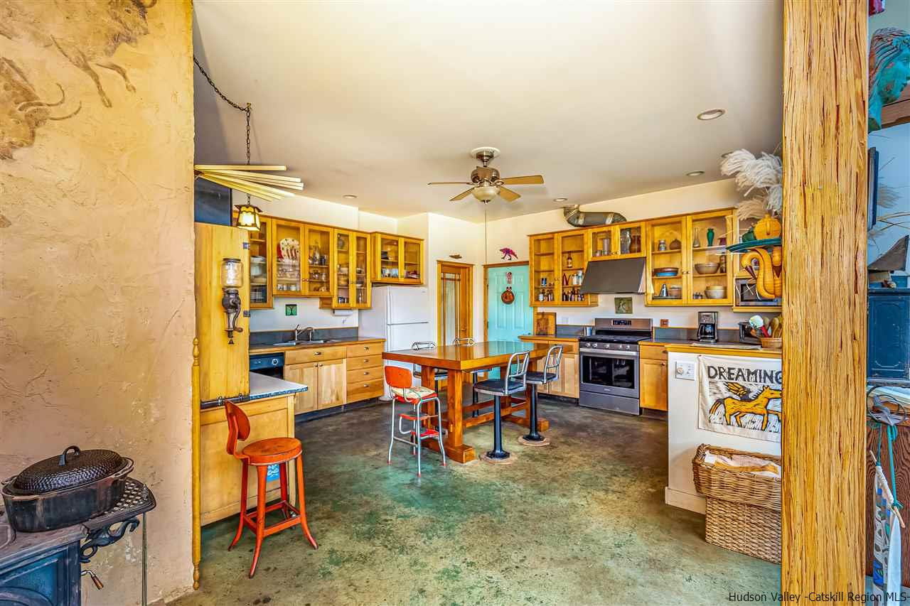 151 Wilhelm Road Saugerties, NY 12477 - Photo 11 of 35 a view of a livingroom with furniture and a flat screen tv