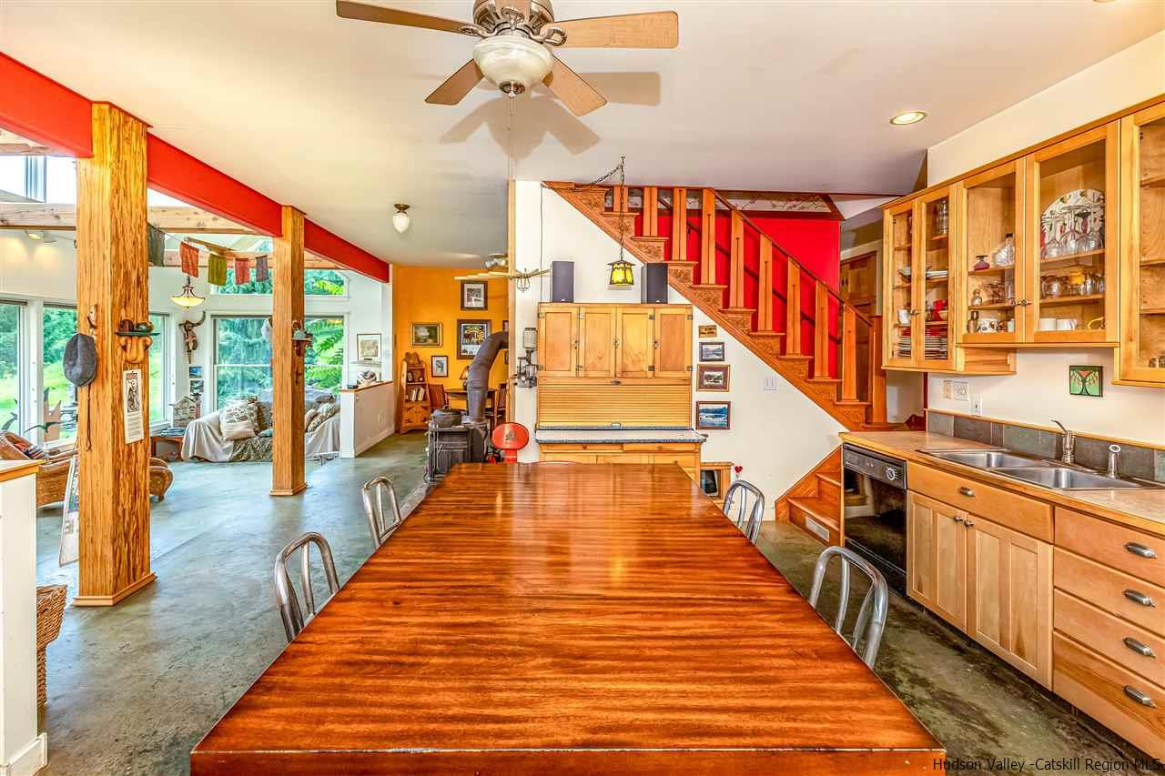 151 Wilhelm Road Saugerties, NY 12477 - Photo 14 of 35 a very nice looking room with wooden floor and large windows
