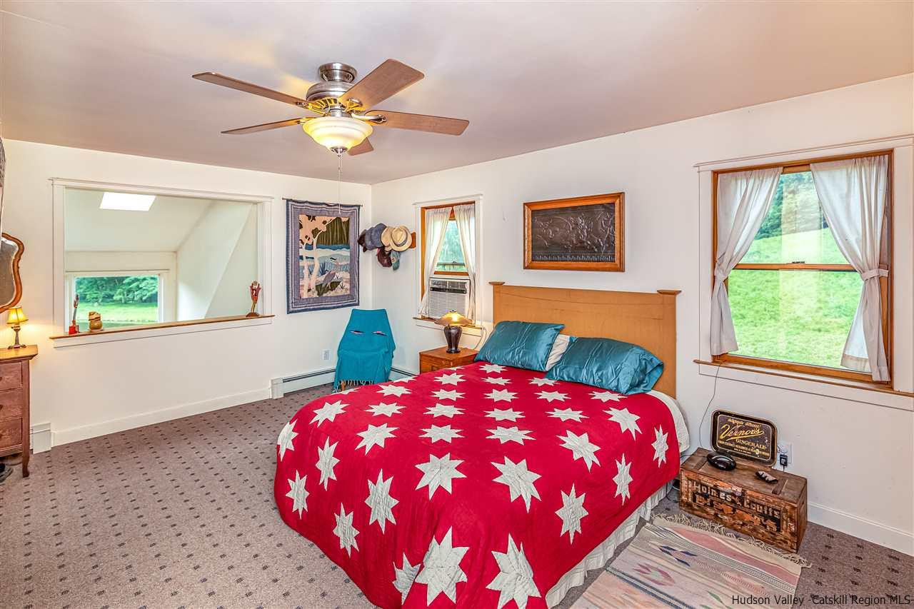 151 Wilhelm Road Saugerties, NY 12477 - Photo 22 of 35 a bedroom with a bed and a window