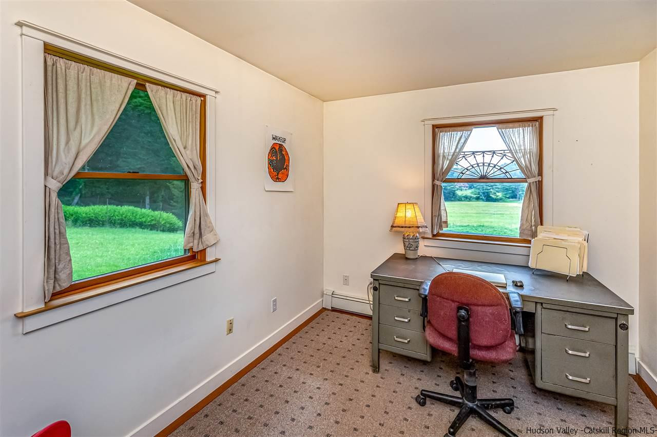 151 Wilhelm Road Saugerties, NY 12477 - Photo 28 of 35 a view of a workspace with furniture and a window