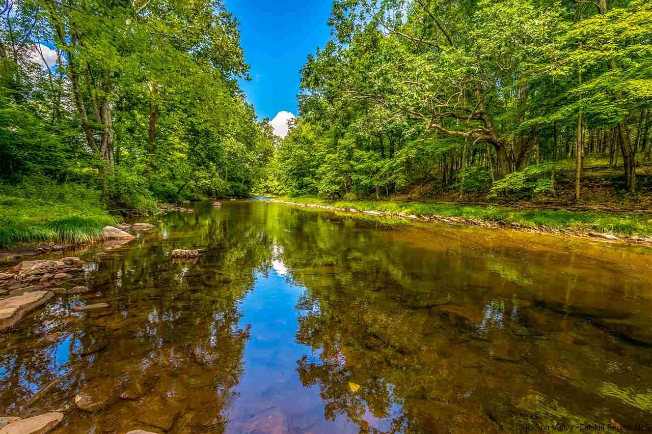 151 Wilhelm Road Saugerties, NY 12477 - Photo 33 of 35 a view of a lake with houses