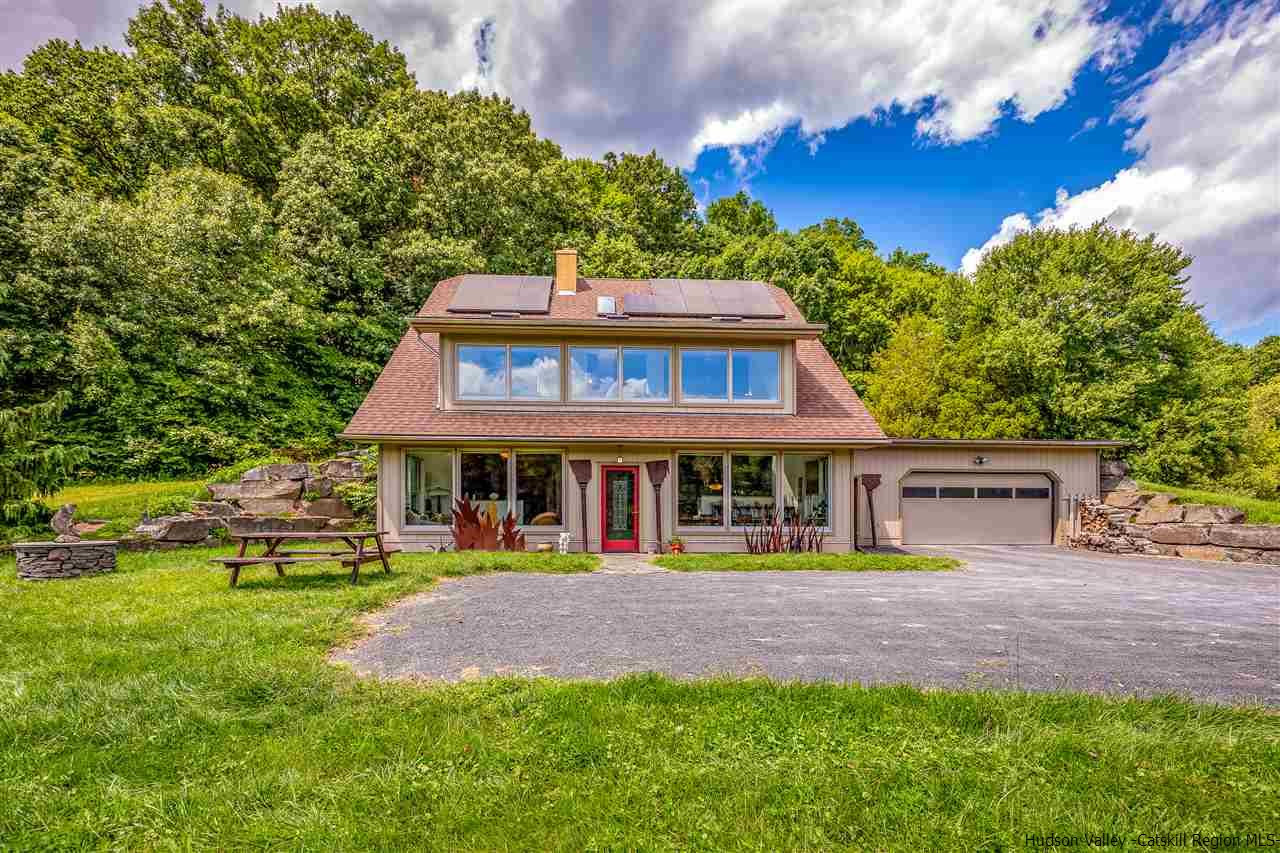 151 Wilhelm Road Saugerties, NY 12477 - Photo 6 of 35 front view of a house with a swimming pool