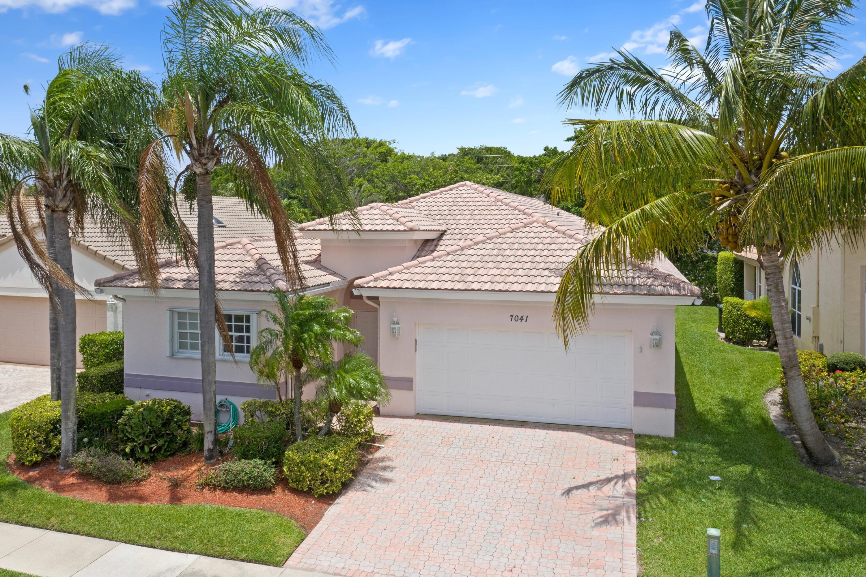 7041 Northwest Turtle Walk Boca Raton, FL 33487 - Photo 1 of 26 Front Exterior