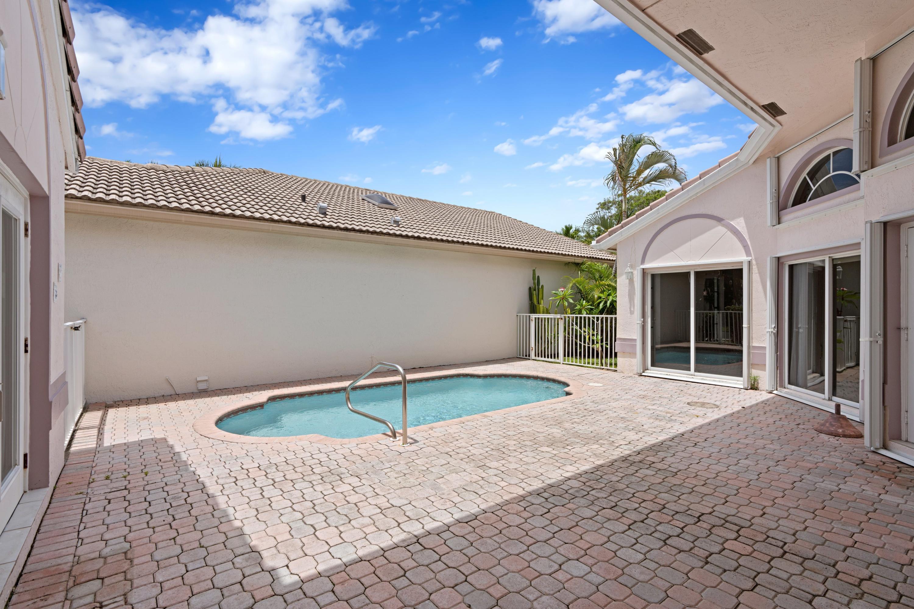 7041 Northwest Turtle Walk Boca Raton, FL 33487 - Photo 3 of 26 Courtyard