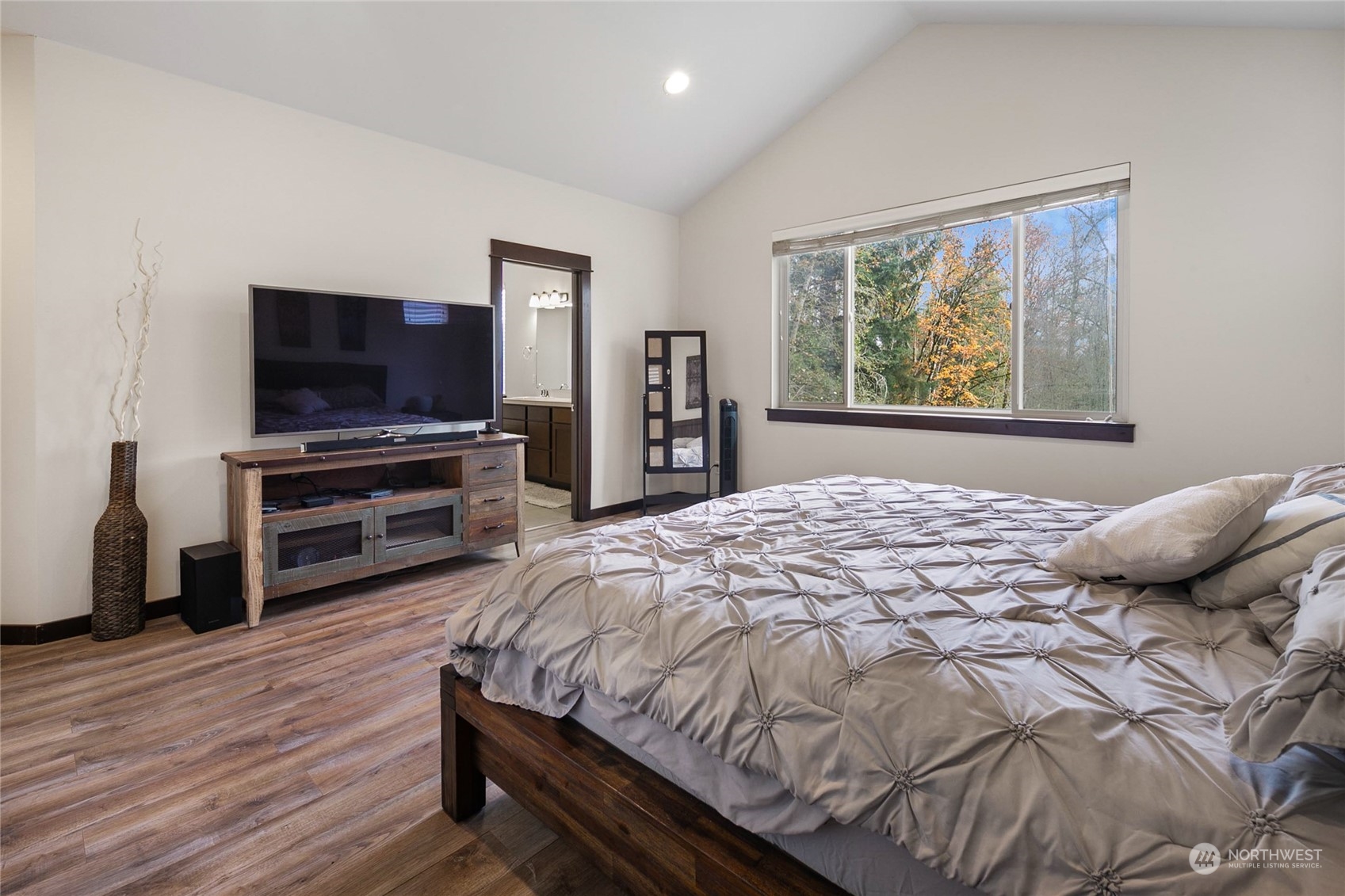 17601 3rd Avenue Southeast Bothell, WA 98012 - Photo 15 of 31 a bedroom with a bed and a flat screen tv
