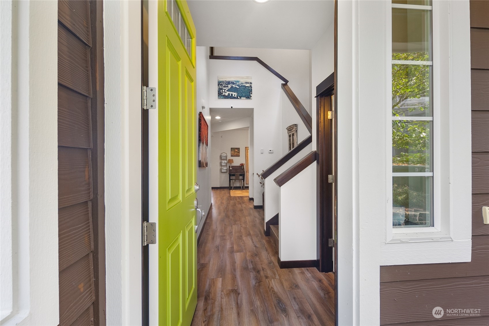 17601 3rd Avenue Southeast Bothell, WA 98012 - Photo 2 of 31 a view of a hallway with wooden floor and stairs
