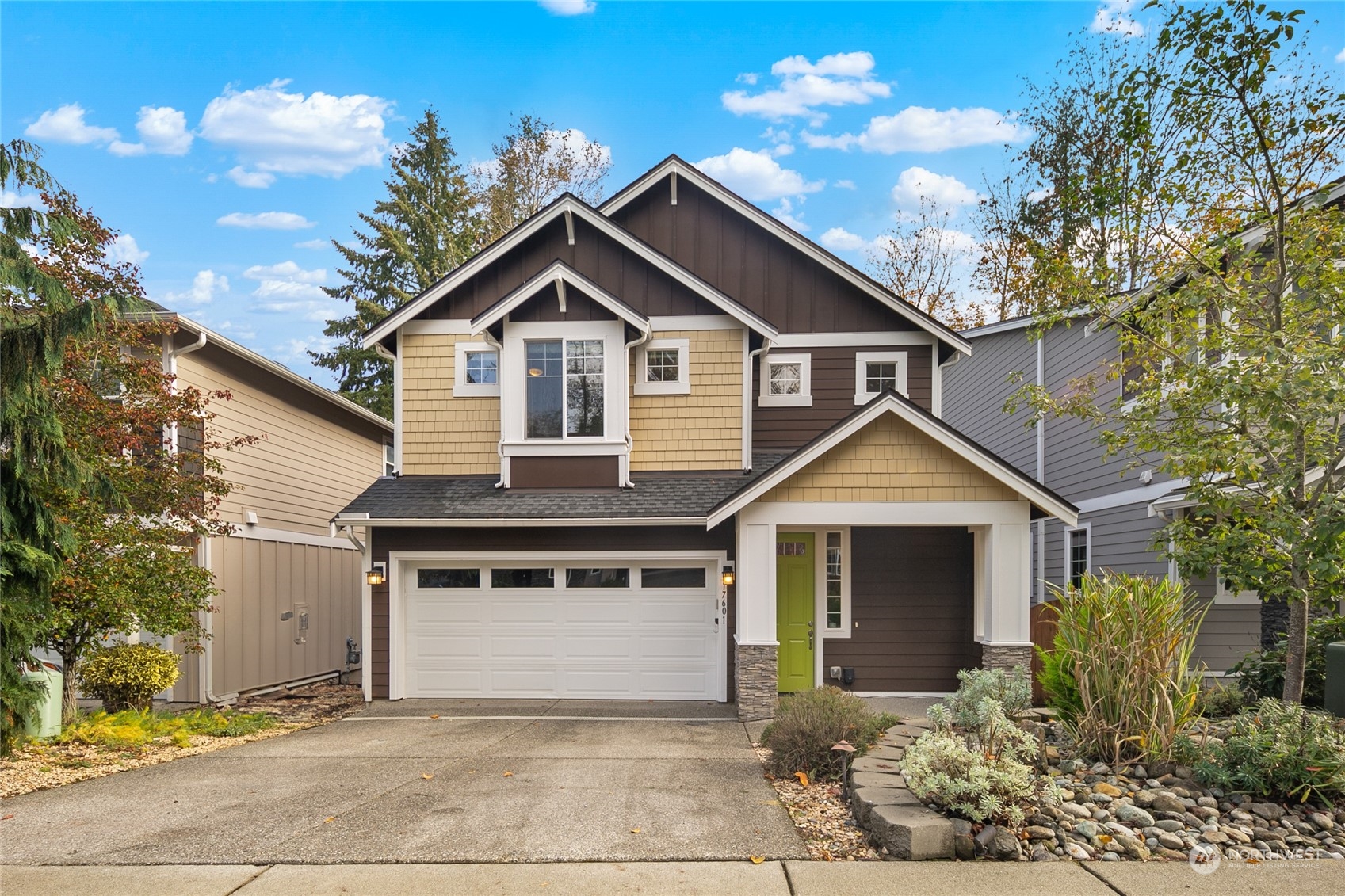 17601 3rd Avenue Southeast Bothell, WA 98012 - Photo 30 of 31 a front view of a house with a yard and garage