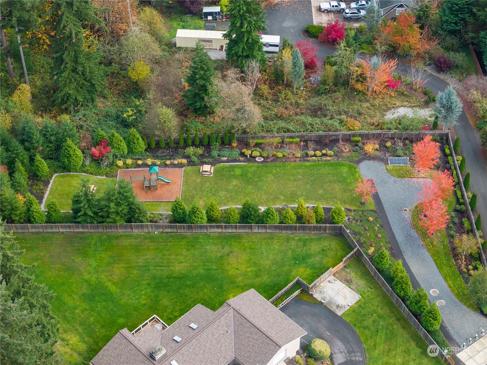 17601 3rd Avenue Southeast Bothell, WA 98012 - Photo 31 of 31 an aerial view of a house with a garden and lake view