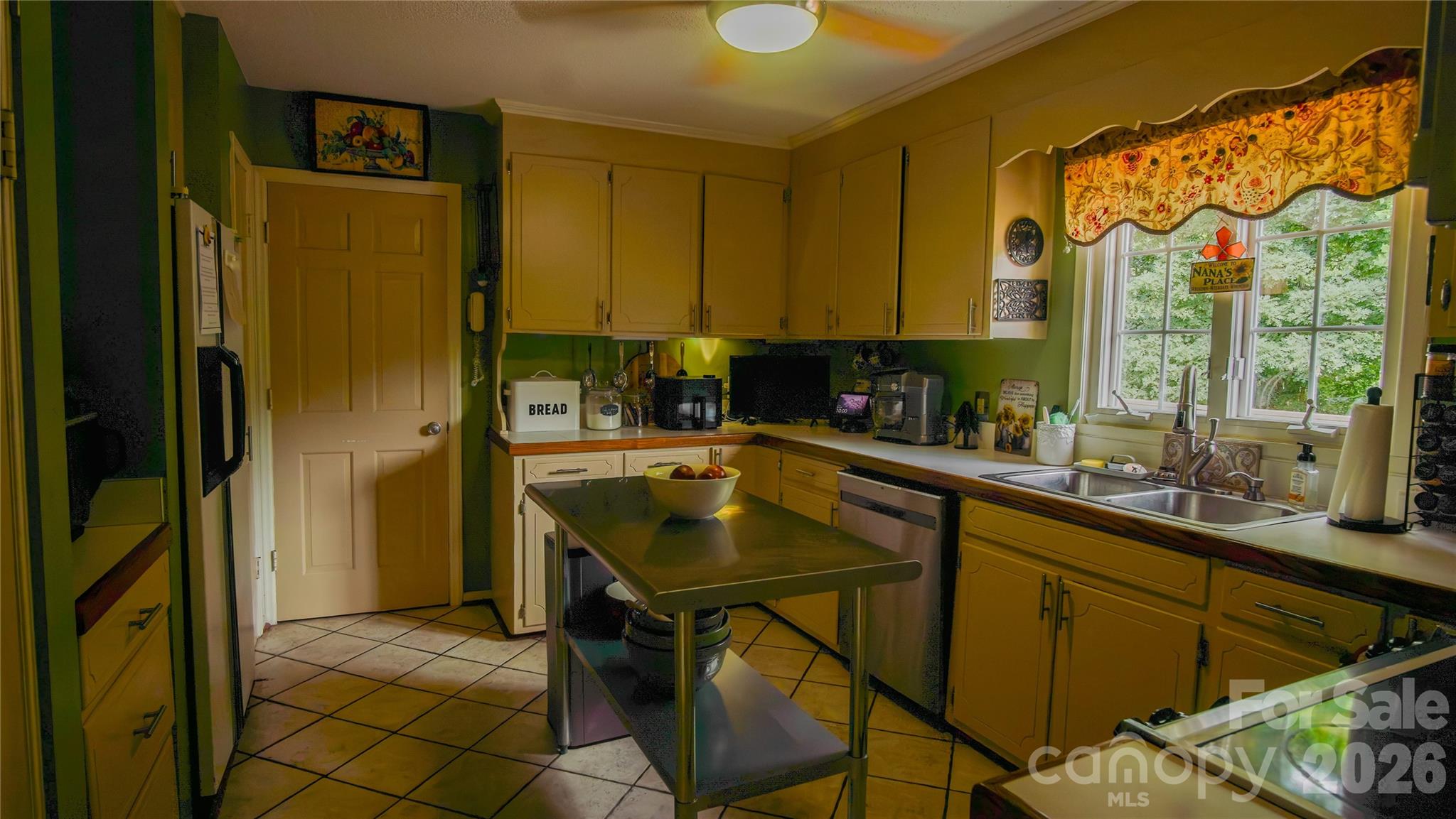 204 Old Stage Coach Road Lawndale, NC 28090 - Photo 18 of 33 a kitchen with a sink and cabinets