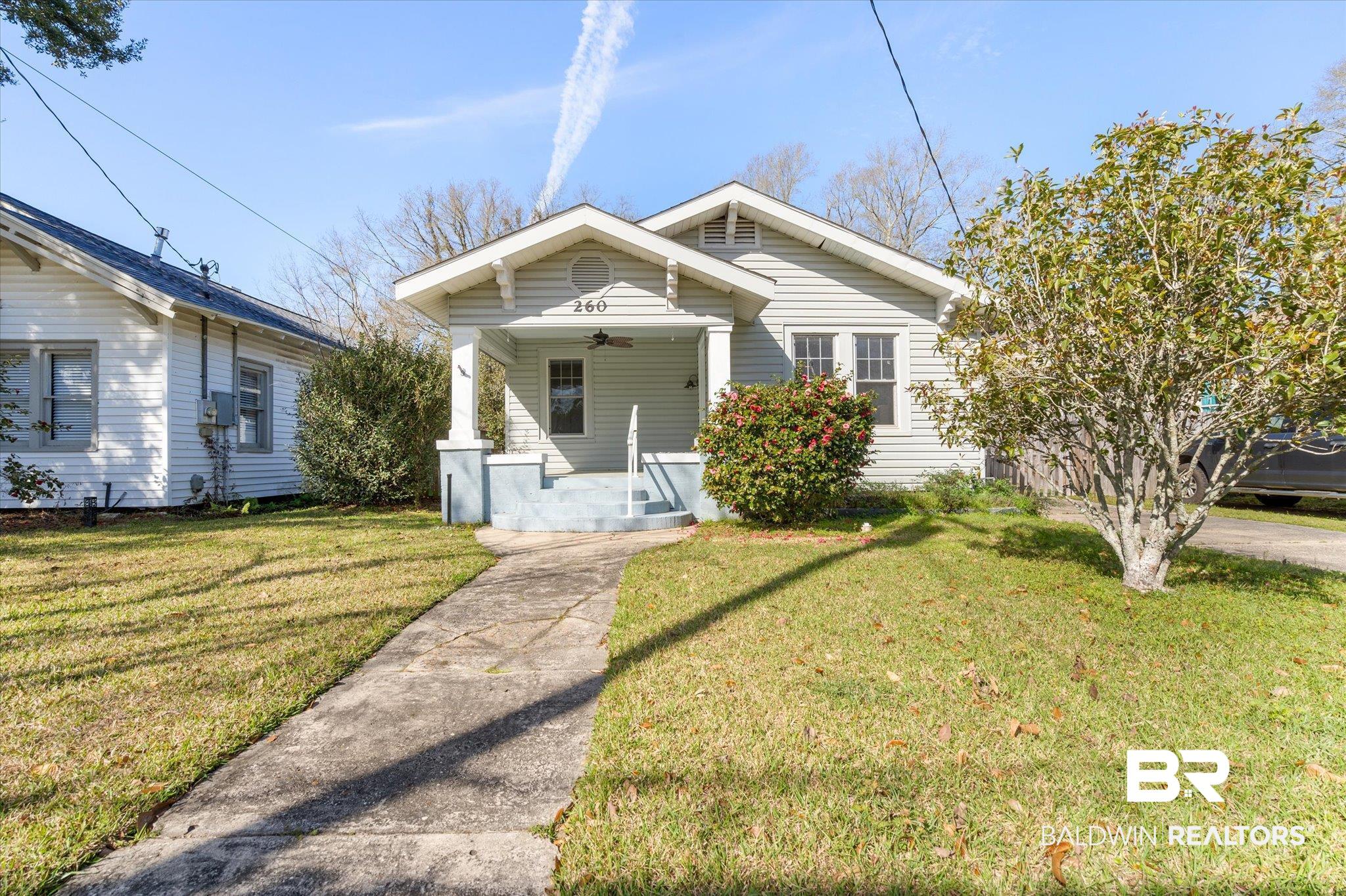 260 Mohawk Street Mobile, AL 36606 - Photo 20 of 20 Bungalow-style house featuring a front lawn, a porch, and ceiling fan